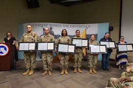 1st TSC Soldiers who received the Gold Presidential Volunteer Service Medal for volunteering