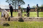 The official party from Naval Surface Warfare Center Panama City Division’s (NSWC PCD) Littoral Innovation and Prototyping Facility Groundbreaking event ceremoniously kicks-off the first building construction project onboard Naval Support Activity Panama City, Fla., (NSA PC) since 2018’s Hurricane Michael, April 21. The official party consisted of (left to right) Congressman Neal Dunn, representing Florida’s 2nd Congressional District, NSWC PCD Commanding Officer Capt. David Back, NSWC PCD Technical Director Dr. Peter Adair, and Commander Michael Mosi, NSA PC commanding officer. (U.S. Navy photo by Eddie Green)