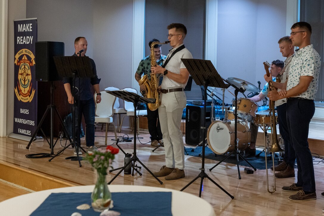 U.S. Marines with the 2d Marine Division Band play music during the Commanding General’s (CG) Spring Reception on Marine Corps Base (MCB) Camp Lejeune, North Carolina, April 27, 2023. The CG Spring Reception was held to promote community relations and celebrate key leaders in the community for their support of service members across Marine Corps Installations East-MCB Camp Lejeune.​ (U.S. Marine Corps photo by Cpl. Jennifer E. Douds)