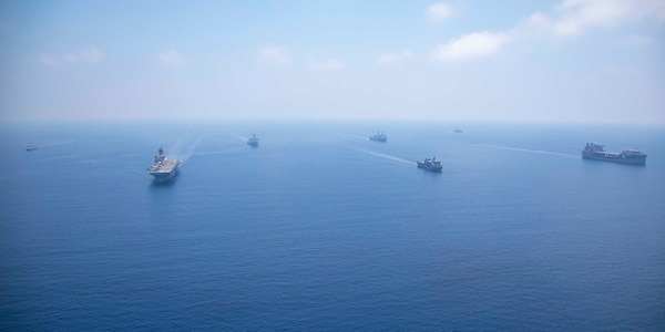 Amphibious assault ship USS Makin Island (LHD 8), amphibious transport docks USS Anchorage (LPD 23) and USS John P. Murtha (LPD 26), expeditionary mobile base USS Miguel Keith (ESB 5), and Philippine navy ships BRP Jose Rizal (FF-150), BRP Gregorio Del Pilar (PS 15), and BRP Tarlac (FF 601) transit the South China Sea for Balikatan 23, April 19, 2023. Balikatan is an annual exercise between the Armed Forces of the Philippines and U.S. military designed to strengthen bilateral interoperability, capabilities, trust, and cooperation built over decades of shared experiences. The Makin Island Amphibious Ready Group, comprised of Makin Island, Anchorage, and John P. Murtha, is operating in the U.S. 7th Fleet area of operations with the embarked 13th Marine Expeditionary Unit to enhance interoperability with Allies and partners and serve as a ready-response force to defend peace and maintain stability in the Indo-Pacific region. (U.S. Navy photo by Mass Communication Specialist 3rd Class Joshua Martinez)