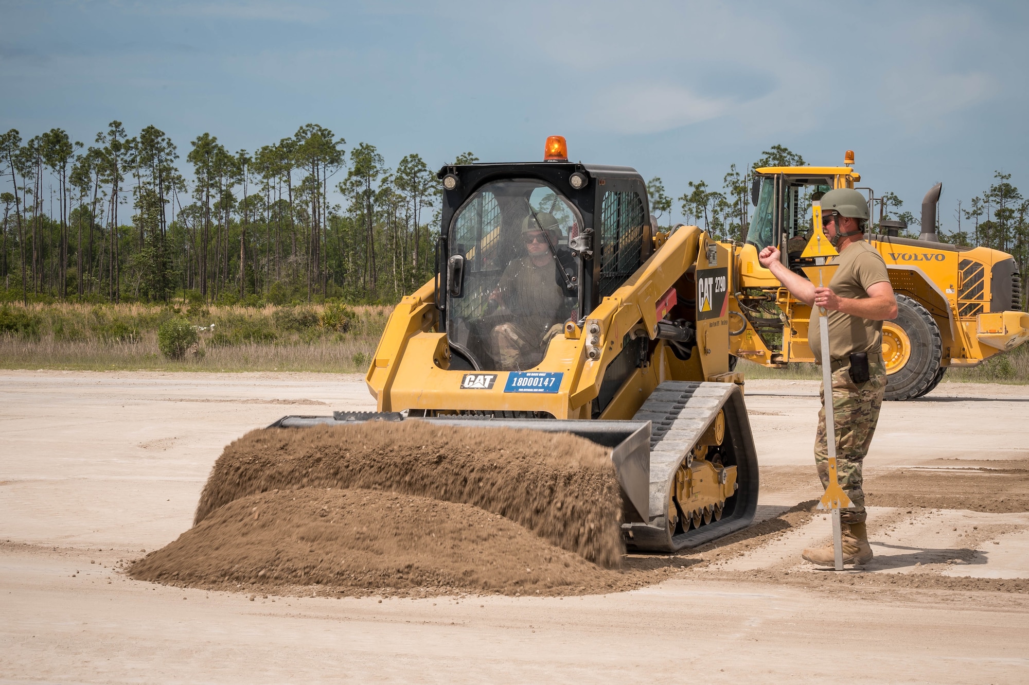 Members of the 914th Civil Engineer Squadron attempt an airfield damage crater repair