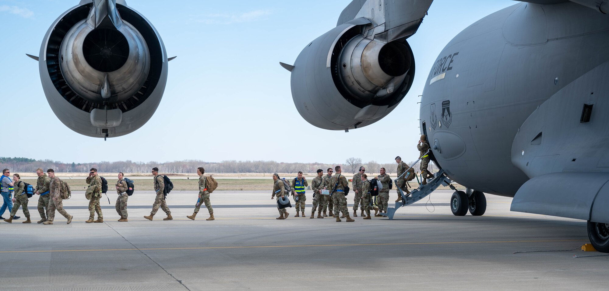 Airmen leave Aircraft.