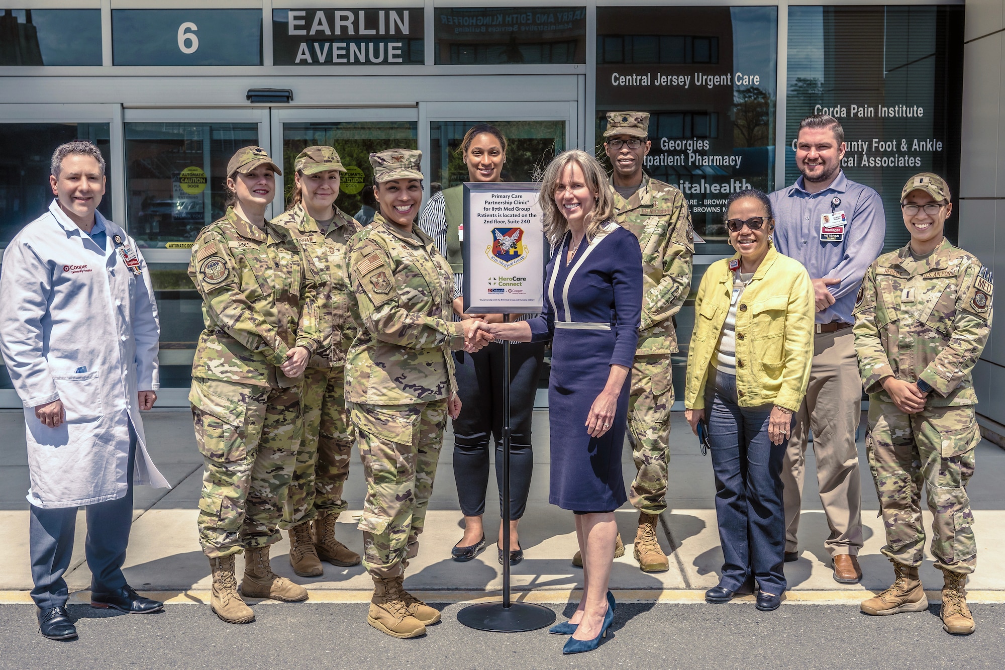 A photograph of military and civilian healthcare providers.