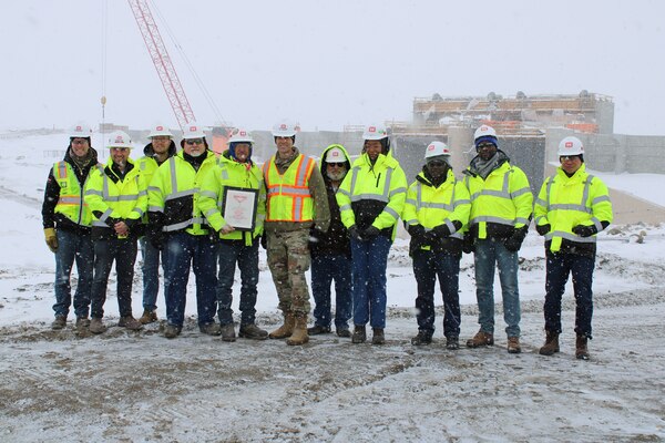 Members of the Western Area Office receive the Civil Servant of the Year award from Col. Eric Swenson.