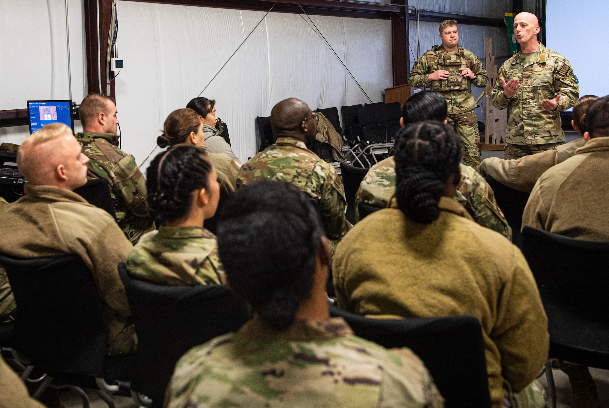 SCHRIEVER SPACE FORCE BASE, Colo. -- Senior Master Sgt. Edward Mann, 50th Security Forces, briefs military members during the initiative "Connecting Airmen and Guardians to the Mission". The initiative was prompted by senior enlisted leaders. (U.S. Space Force Photo by Tiana Williams)