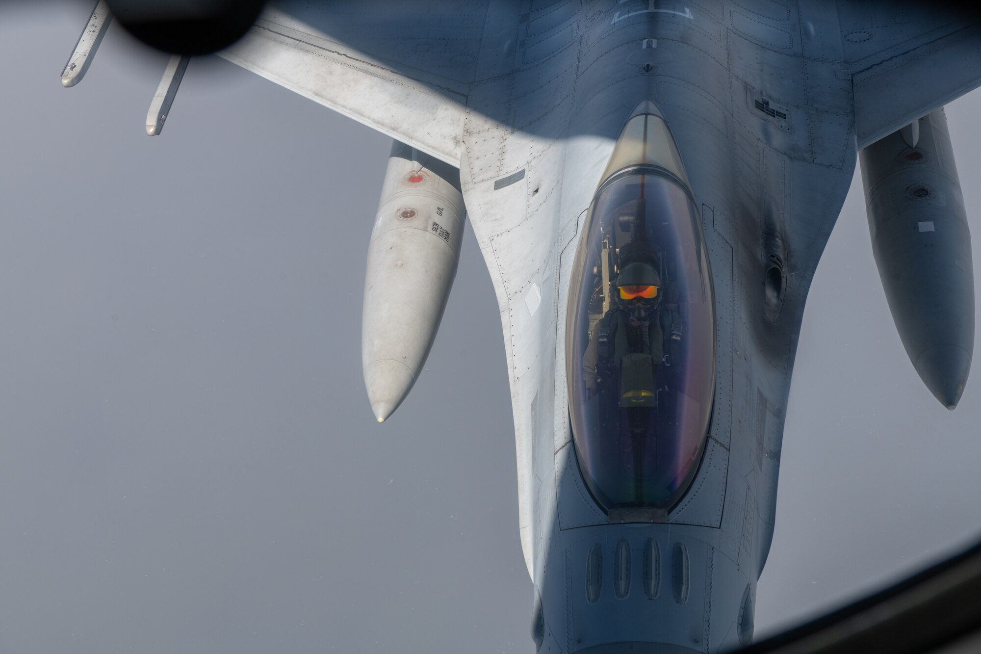 A Republic of Korea air force KF-16 receives fuel from a U.S. Air Force KC-135 Stratotanker during Korea Flight Training Apr. 21, 2023. KFT integrates U.S. and Republic of Korea forces to train for air-to-air and air-to-ground missions, strengthening interoperability and building mutual understanding and trust between the two nations. (U.S. Air Force photo by Senior Airman Cedrique Oldaker)