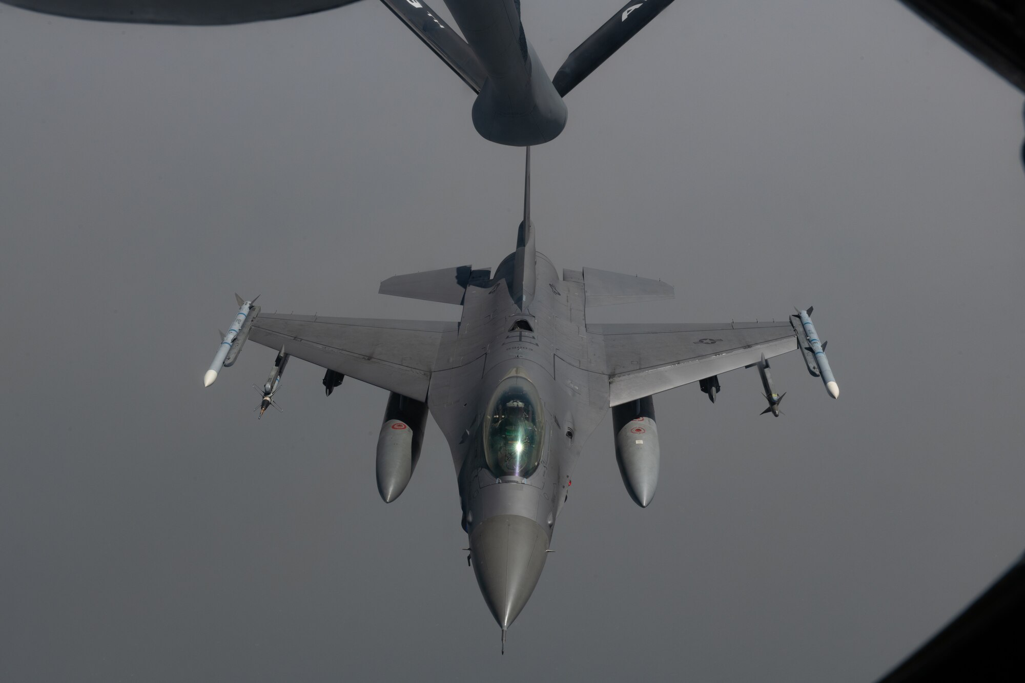 A U.S. Air Force F-16 Fighting Falcon prepares to receive fuel from a U.S. Air Force KC-135 Stratotanker during Korea Flight Training Apr. 21, 2023. The exercise was part of a routine training schedule designed to enhance integration of combined and joint airpower execution through face-to-face planning, briefing, and debriefing; and to train mission commanders and aircrew to operate and succeed in scenarios with a robust surface-to-air and air-to-air threats. (U.S. Air Force photo by Senior Airman Cedrique Oldaker)