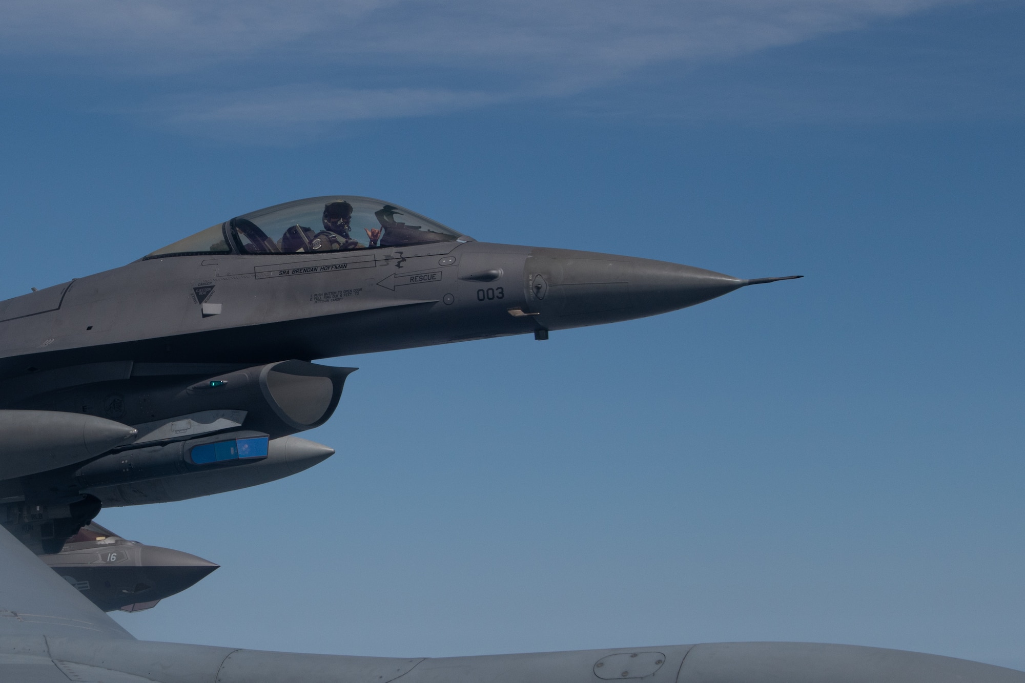 A U.S. Air Force F-16 Fighting Falcon flies alongside a U.S. Air Force KC-135 Stratotanker during Korea Flight Training Apr. 21, 2023. KFT integrates U.S. and Republic of Korea forces to train for air-to-air and air-to-ground missions, strengthening interoperability and building mutual understanding and trust between the two nations. (U.S. Air Force photo by Senior Airman Cedrique Oldaker)