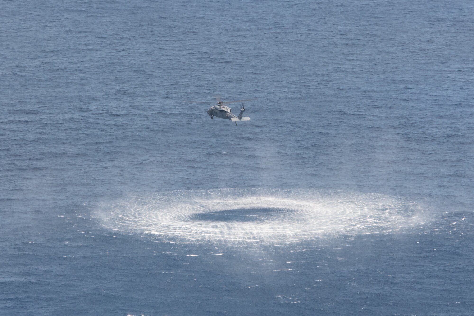 A helicopter hovers during training.