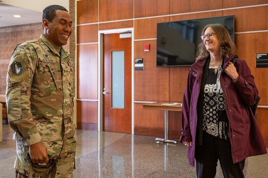  Col. Marcus Jackson, Space Base Delta 2 commander, alongside Dr. Michele Gaudreault, Deputy Chief Scientist, Space Operations Command, greet one another at Buckley Space Force Base, Colo., April 28, 2023. Dr. Gaudreault visited Space Base Delta 2, as well as Space Delta 4 components for office calls. (U.S. Space Force photo by Airman 1st Class Shaun Combs)