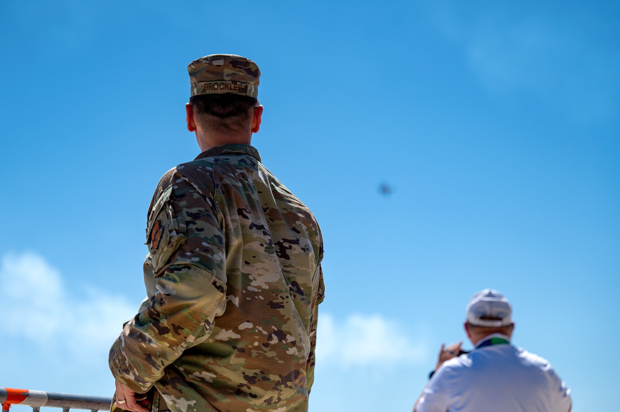 U.S. Air Force Lt. Col. Kevin Brockler, 81st Mission Support Group deputy commander, views the Thunderbirds practice session for the 2023 Thunder Over the Sound Air and Space Show at Biloxi Beach in Biloxi, Mississippi, April 28, 2023. Thunder Over the Sound is a unique event where a military installation and its surrounding city jointly host an air show in two locations; Biloxi Beach and Keesler's flightline. (U.S. Air Force photo by Airman 1st Class Trenten Walters)