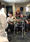 Sailors from the USS Cole (DDG-67) and USS Indiana (SSN-789) visit with veterans at the Alexander "Sandy" Nininger Veterans Nursing during Fleet Week Port Everglades.