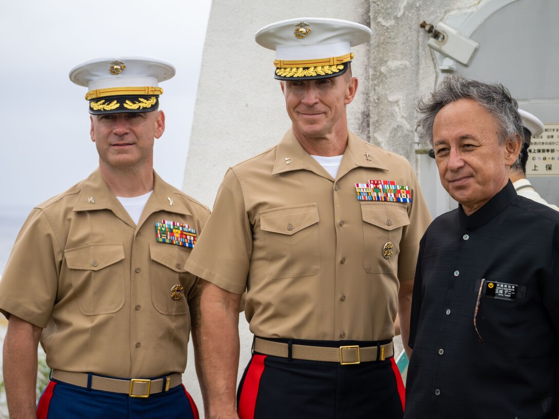 From left, U.S. Marine Corps Col. Steven Eastin, the Marine Corps Installations Pacific assistant chief of staff for government and external affairs, Lt. Gen. Stephen E. Liszewski, the commanding general of MCIPAC, and Denny Tamaki, the Okinawa Prefectural Governor, pose for a photo following the Ie Shima Lighthouse Memorial Service on Ie Shima, Okinawa, Japan, April 21, 2023. The memorial service is held each year in remembrance of World War II casualties, and specifically the lightkeeper and his family who passed away during an air raid on the island. (U.S. Marine Corps photo by Cpl. Zachary Sarvey).