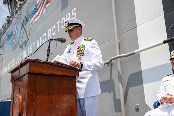 Capt. Tony Chavez speaks during a change of command ceremony on the flight deck of amphibious assault ship USS Makin Island (LHD 8), April 28, 2023 in the Philippines. The change of command ceremony is a time-honored naval tradition which formally proclaims the continuity and authority of command to the officers, men and women of the command. The Makin Island Amphibious Ready Group, comprised of Makin Island and amphibious transport dock USS Anchorage (LPD 23) and USS John P. Murtha (LPD 26), is operating in the U.S. 7th Fleet area of operations with the embarked 13th Marine Expeditionary Unit to enhance interoperability with Allies and partners and serve as a ready-response force to defend peace and maintain stability in the Indo-Pacific region.