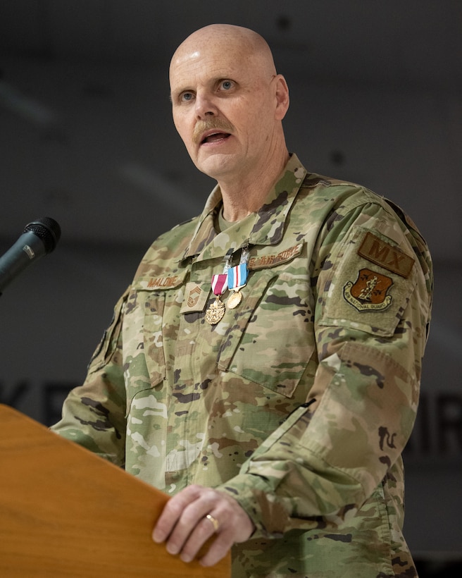 Chief Master Sgt. David Malone, 123rd Maintenance Group senior enlisted advisor, speaks during his retirement ceremony at the Kentucky Air National Guard Base in Louisville, Ky., Feb. 5, 2023. Malone is retiring after more than 35 years of service to the Kentucky Air National Guard and United States Air Force. (U.S. Air National Guard photo by Tech. Sgt. Joshua Horton)