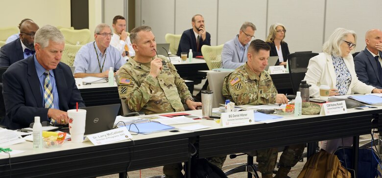 Brigadier Gen. Daniel Hibner, U.S. Army Corps of Engineers, South Atlantic Division commander, center, listens to a presentation by a of the district commander during the fourth quarter FY 2023 SAD Regional Governance Meeting at the U.S. Army Engineering and Support Center, Huntsville, Alabama, July 25, 2023. The RGM provides district commanders, the deputy of programs and project management and other staff an opportunity to present relevant topics requiring decisions from the SAD commander. (U.S. Army photo by Chuck Walker)