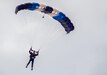 Command Sgt. Maj. Michael Grunst parachutes into his retirement ceremony July 21, 2023, at Camp Carroll on Joint Base Elmendorf-Richardson. Grunst joined the Alaska Army National Guard in 1989 and finished his 34-year career as the G3 operations sergeant major for the AKARNG.