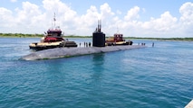 A photo of the Los Angeles-class fast-attack submarine USS Albany (SSN 753) conducted a port visit to Cape Canaveral for an ordnance reload, personnel transfer, and brief liberty call before heading back to sea. Los Angeles-class fast-attack submarines are capable of supporting various missions, including anti-submarine warfare, anti-surface ship warfare, strike warfare, and intelligence, surveillance, and reconnaissance.