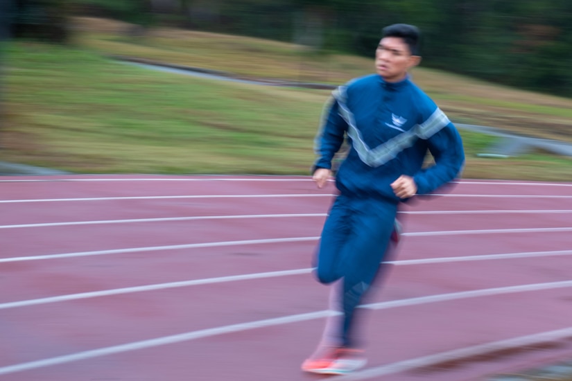 An airman races on a track.