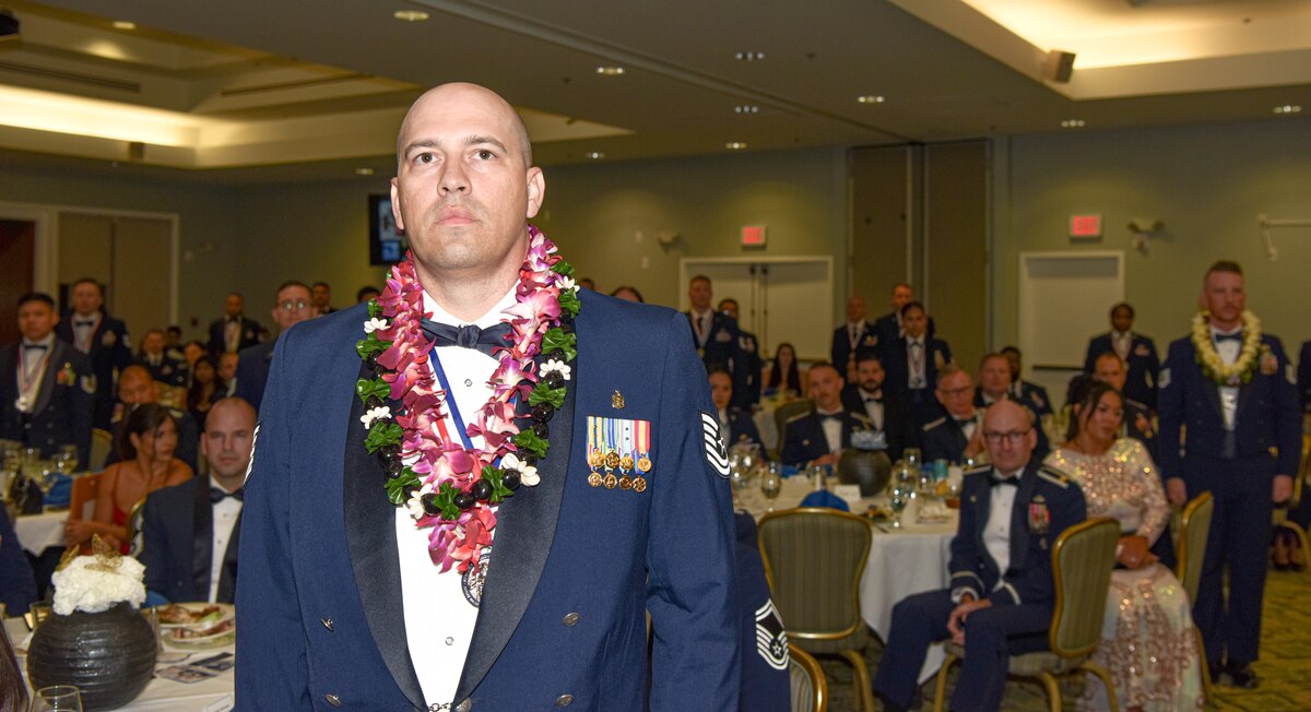 U.S. Air Force Senior Non-Commissioned officer inductees stand at attention during a SNCO induction ceremony at Joint Base Pearl Harbor-Hickam, Hawaii, July 29, 2023. All SNCO inductees stood at attention while Chief Master Sgt. Anthony Thompson Jr.,15th Wing command chief, read the senior non-commissioned officer oath.
(U.S. Air Force photo by Tech. Sgt. Anthony Nelson Jr. )