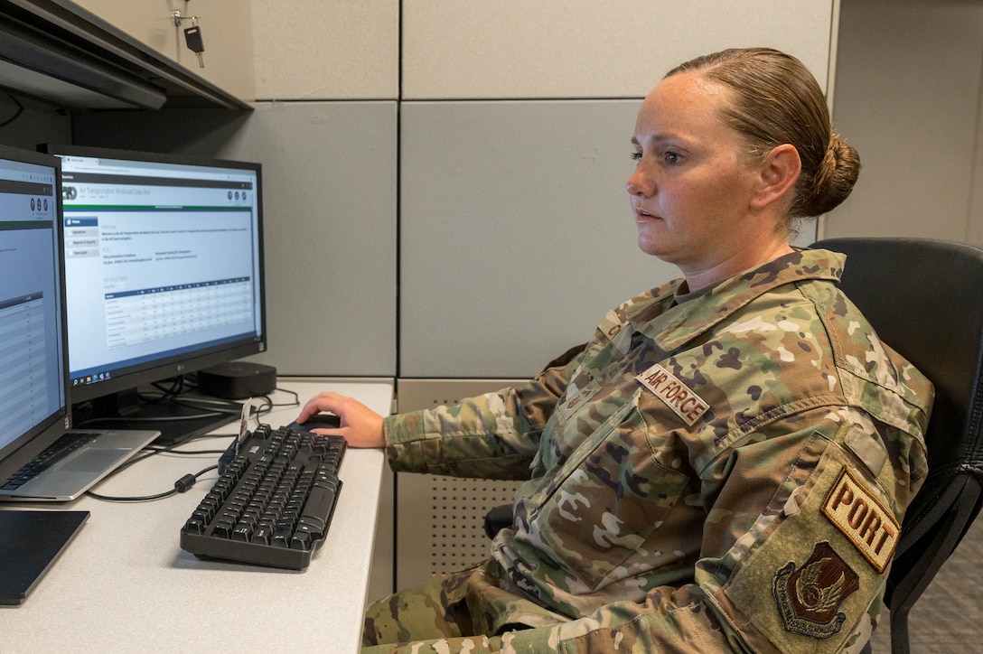 Senior Master Sgt. Chelsea Owens, Air Transportation superintendent with the Air Force Installation and Mission Support Center reviews reports entered on the Workload Data Tool, Joint Base San Antonio-Lackland, Texas, July 27, 2023. AFIMSC Deployment and Distribution Division’s Air Transportation Team developed data-based inventory tools to help the Department of the Air Force deliver faster and more efficient logistics support across the DOD. (Photo by Malcolm McClendon).