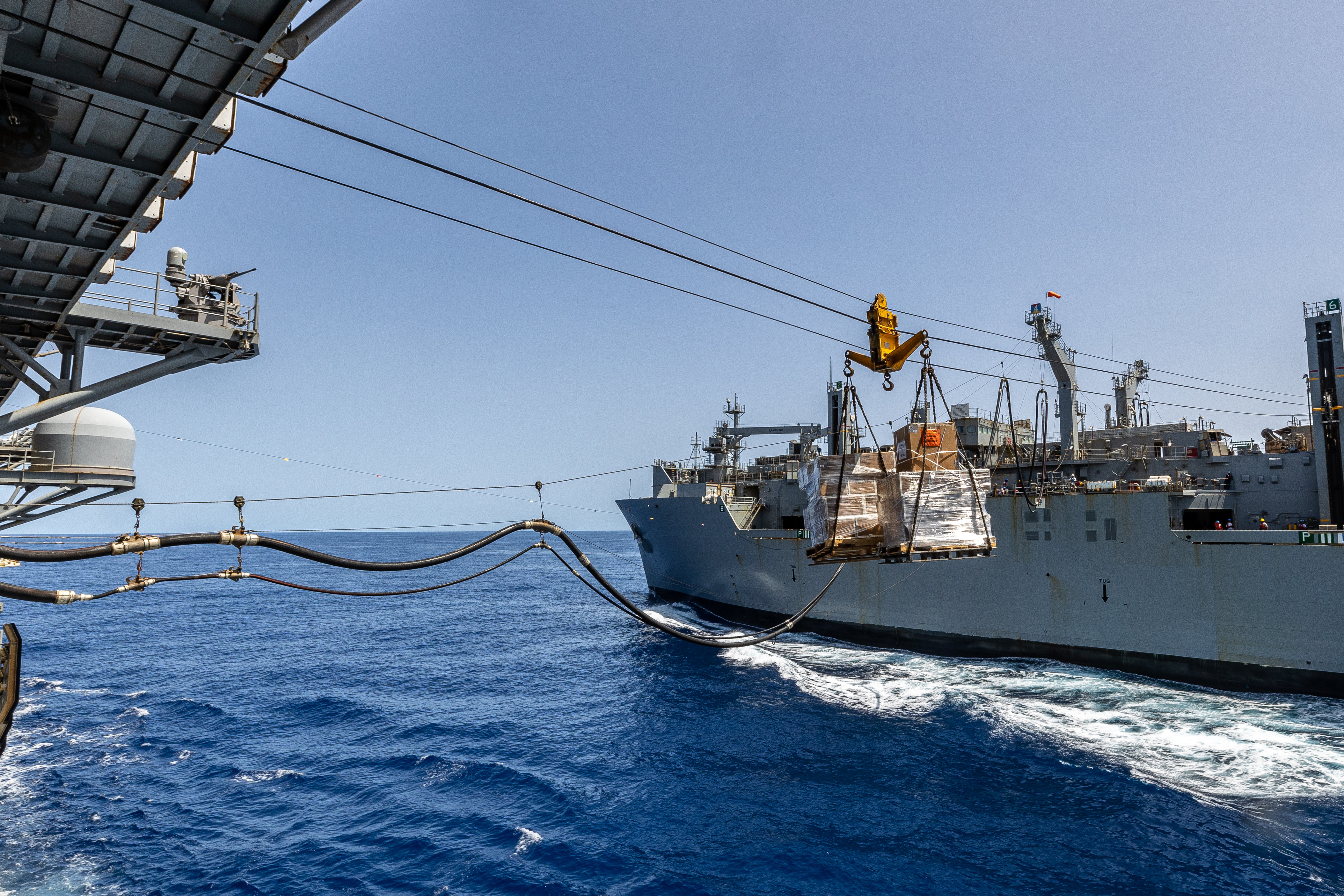 USS Bataan (LHD 5) replenishments from USNS Medgar Evers (T-AKE 13) in the Mediterranean Sea.