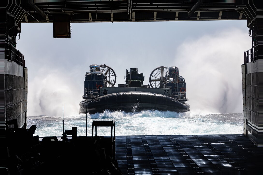 A U.S. Navy LCAC enters the well deck of the San Antonio class amphibious transport docking ship USS Mesa Verde (LPD 19) on the Atlantic Ocean, July 25, 2023. The USS Mesa Verde (LPD-19), assigned to the Bataan Amphibious Ready Group and embarked 26th Marine Expeditionary Unit (Special Operations Capable), under the command and control of Task Force 61/2, is on a scheduled deployment in the U.S. Naval Forces Europe area of operations, employed by U.S. Sixth Fleet to defend U.S., allied and partner interests.