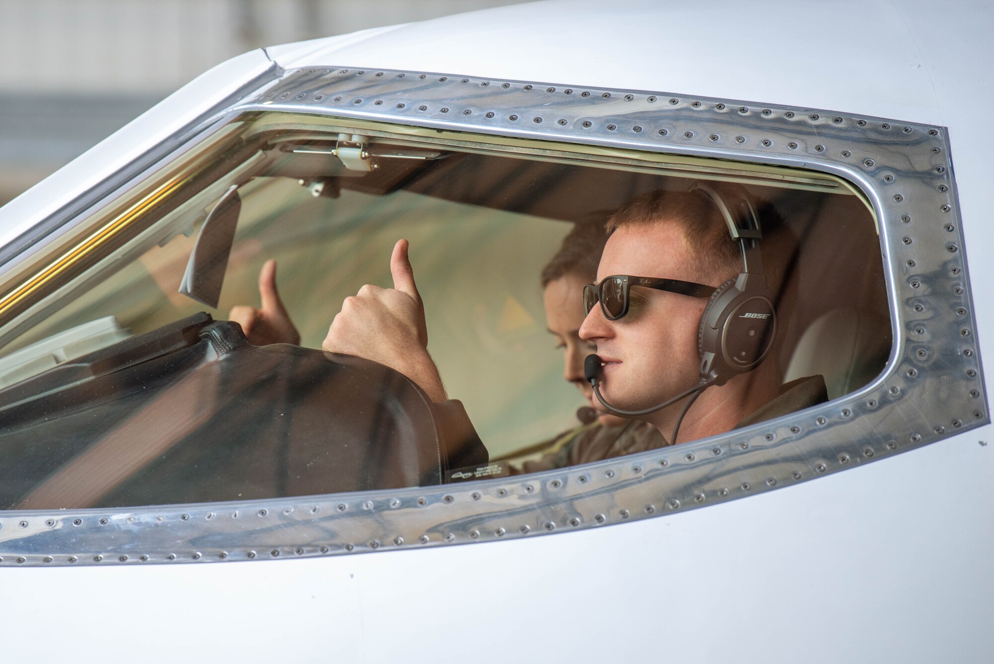 An Airman prepares to fly a C-21A aircraft