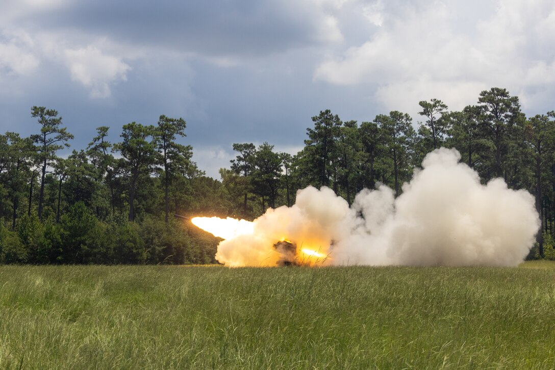 U.S. Marines with 2d Battalion, 10th Marine Regiment, 2d Marine Division fire a High Mobility Artillery Rocket System during a Marine Corps Combat Readiness Evaluation (MCCRE) on Camp Lejeune, North Carolina, July 30, 2023. The purpose of a MCCRE is to formally evaluate the unit’s combat readiness in preparation for deployment. (U.S. Marine Corps photo by Lance Cpl. Osmar Gutierrez)