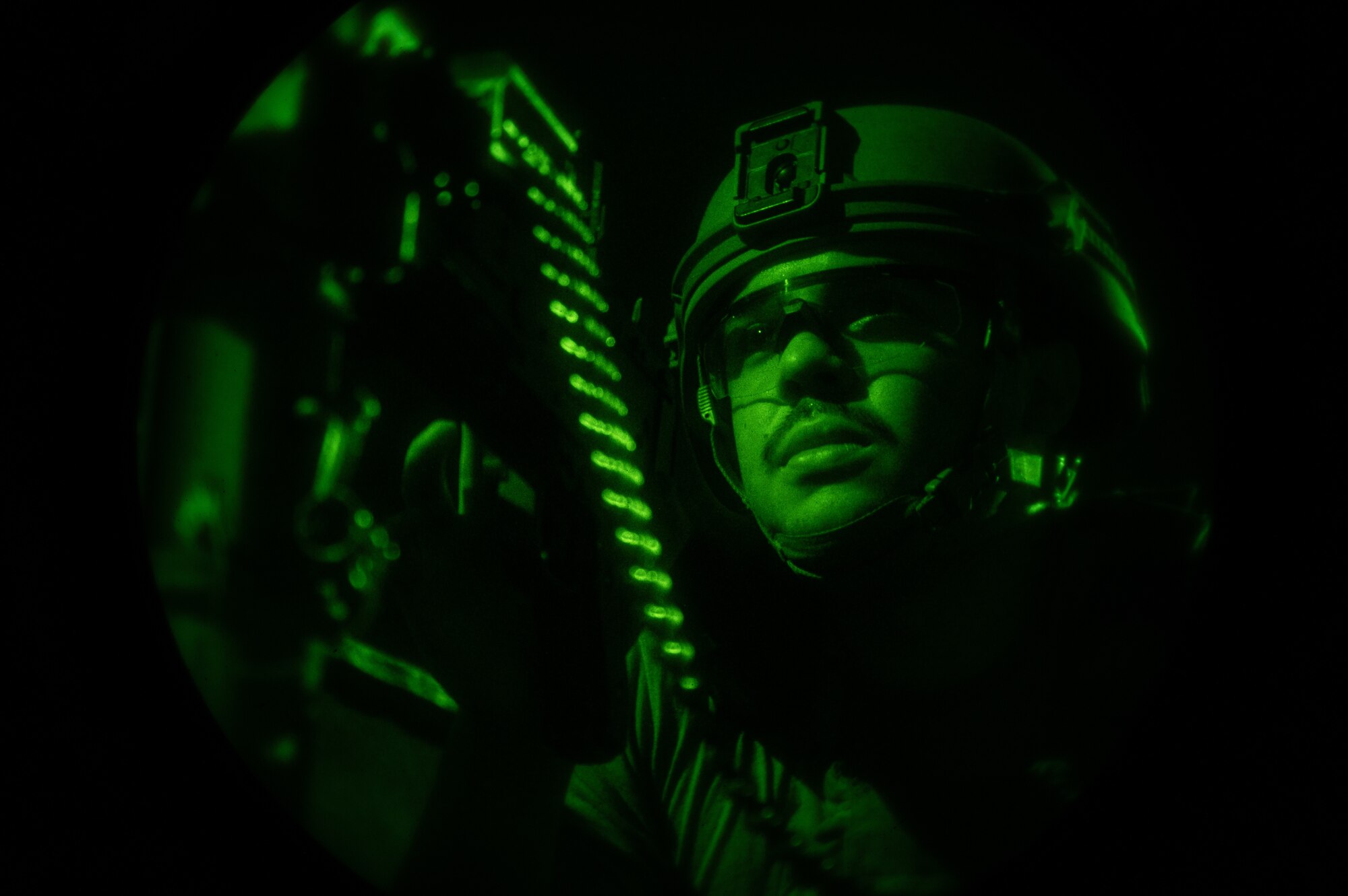 U.S. Air Force Airman Pedro Quinones, 51st Security Forces Squadron Defender, scans the area for opposing forces during a simulated ground attack at Osan Air Base, Republic of Korea, on Aug. 1, 2023. The training from simulated ground attacks enables Airmen to develop effective response strategies and enhance their readiness for potential real-world scenarios. (U.S. Air Force photo by Staff Sgt. Thomas Sjoberg)