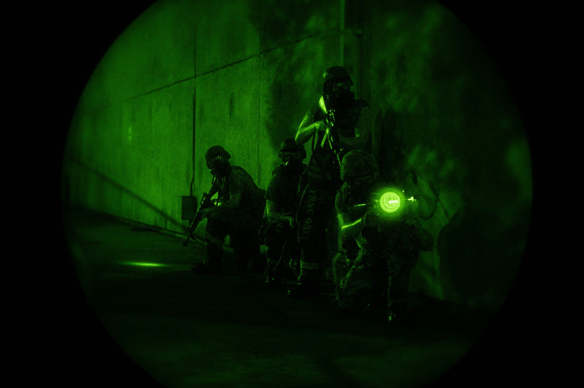 U.S. Air Force Airmen from the 51st Communications Squadron, deter opposing forces (OPFOR) during a simulated ground attack at Osan Air Base, Republic of Korea, Aug. 1, 2023. Simulated ground attacks enhance combat readiness by providing realistic training scenarios for Airmen. (U.S. Air Force photo by Staff Sgt. Thomas Sjoberg)