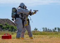 U.S. Airmen, assigned to the 5th Civil Engineer Squadron explosive ordnance disposal (EOD) flight, conduct a scan during a readiness exercise at Minot Air Force Base, North Dakota, July 27, 2023. EOD technicians are trained and equipped to neutralize conventional, nuclear, biological, and chemical ordnances. (U.S. Air Force photo by Airman 1st Class Kyle Wilson)