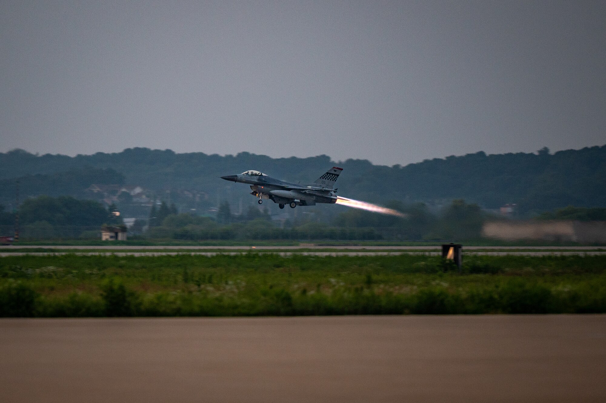 A U.S. Air Force F-16 Fighting Falcon assigned to the 51st Fighter Wing, Osan Air Base, Republic of Korea, soars into the sky after taking off from Osan AB, Republic of Korea, Aug. 1, 2023. The F-16 Fighting Falcon is a highly versatile and agile multirole fighter aircraft, renowned for its exceptional performance and capabilities. (U.S. Air Force photo by Staff Sgt. Thomas Sjoberg)