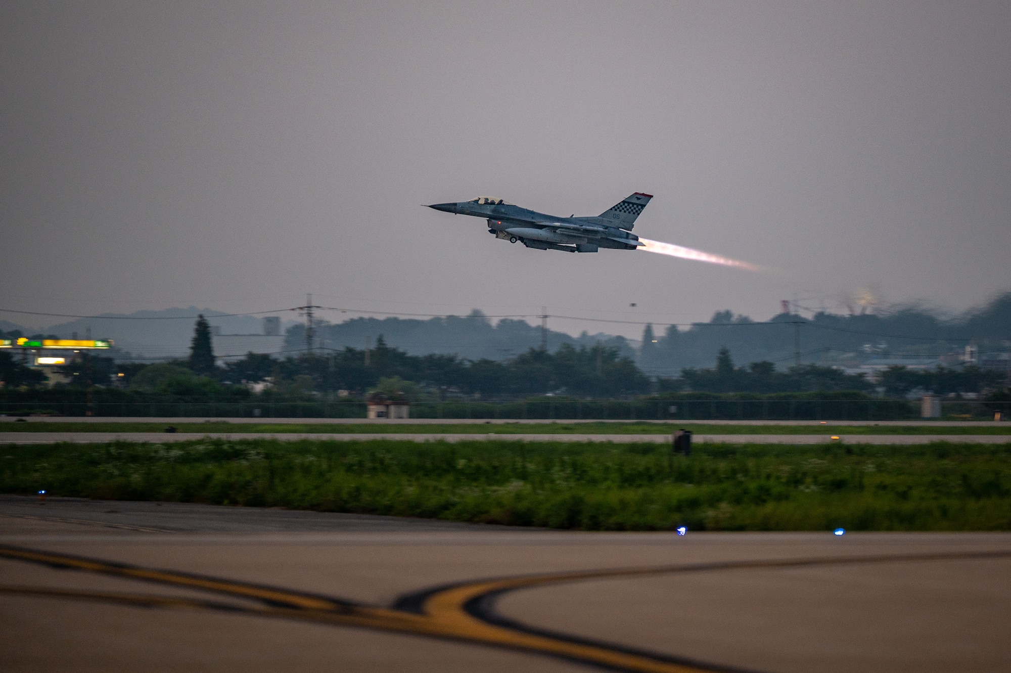 A U.S. Air Force F-16 Fighting Falcon assigned to the 51st Fighter Wing, Osan Air Base, Republic of Korea, soars into the sky after taking off from Osan AB, Republic of Korea, Aug. 1, 2023.  The F-16 Fighting Falcon is a highly versatile and agile multirole fighter aircraft, renowned for its exceptional performance and capabilities. (U.S. Air Force photo by Staff Sgt. Thomas Sjoberg)