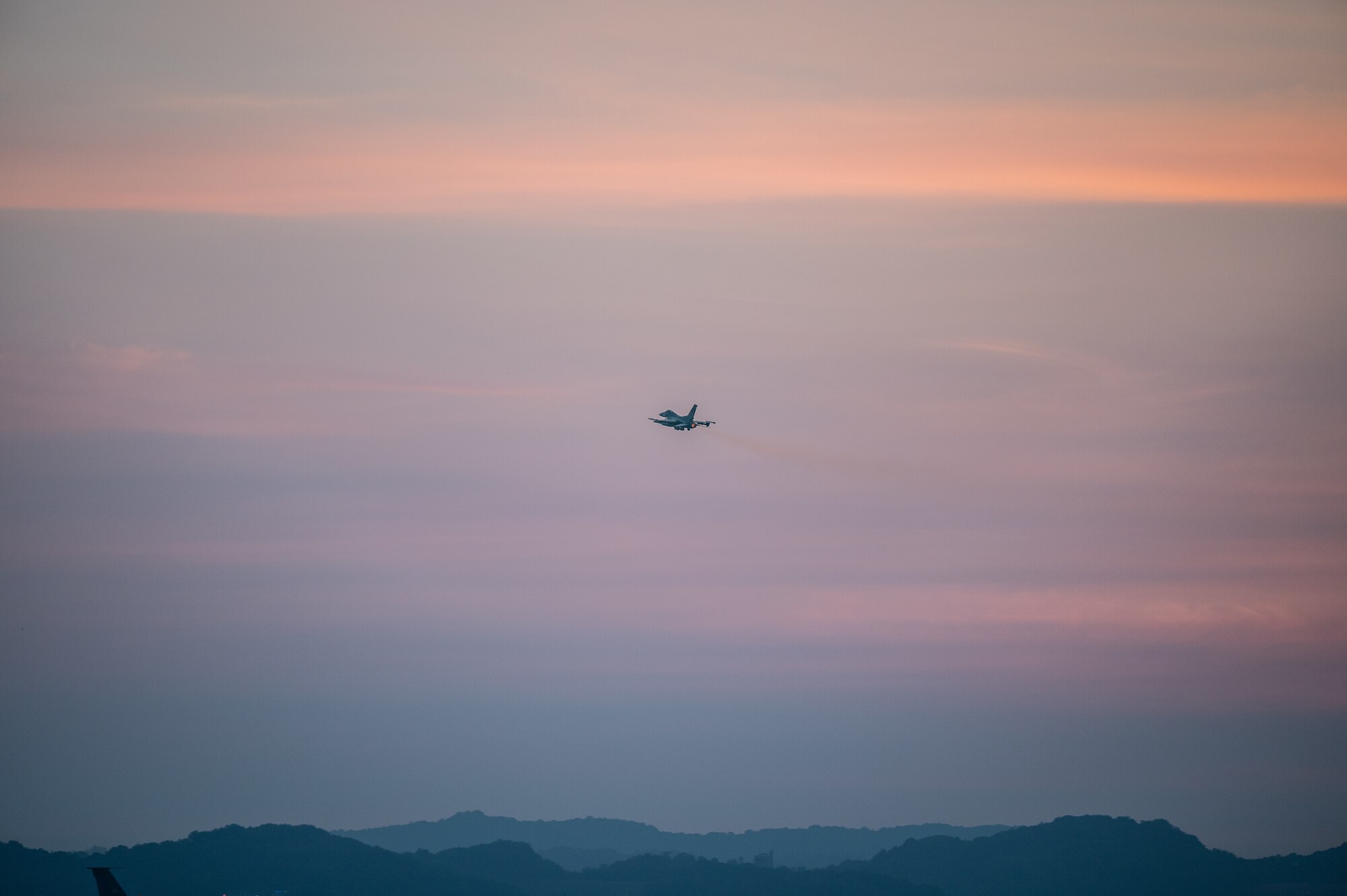 A U.S. Air Force F-16 Fighting Falcon assigned to the 51st Fighter Wing, Osan Air Base, Republic of Korea, soars into the sky after taking off from Osan AB, Republic of Korea, Aug. 1, 2023. The F-16 Fighting Falcon is a highly versatile and agile multirole fighter aircraft, renowned for its exceptional performance and capabilities. (U.S. Air Force photo by Staff Sgt. Thomas Sjoberg)