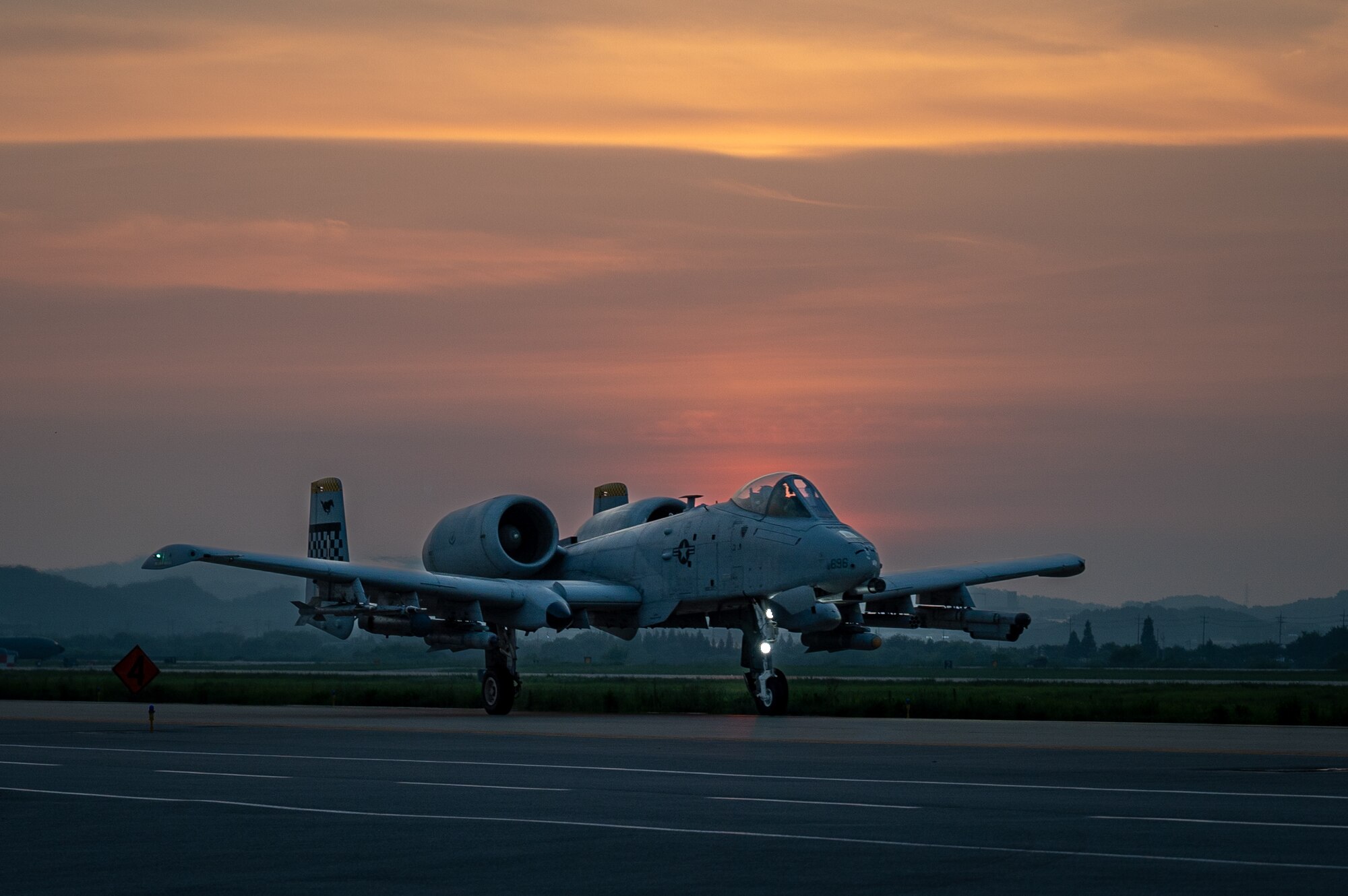 A U.S. Air Force A-10C Thunderbolt II assigned to the 51st Fighter Wing, takes off using an Alternate Landing Surface (ALS) at Osan AB, Republic of Korea, Aug. 1, 2023. The ALS ensures uninterrupted operations, even with main runway damage, showcasing the 51st FWs resilience and commitment to mission readiness. (U.S. Air Force photo by Staff Sgt. Thomas Sjoberg)