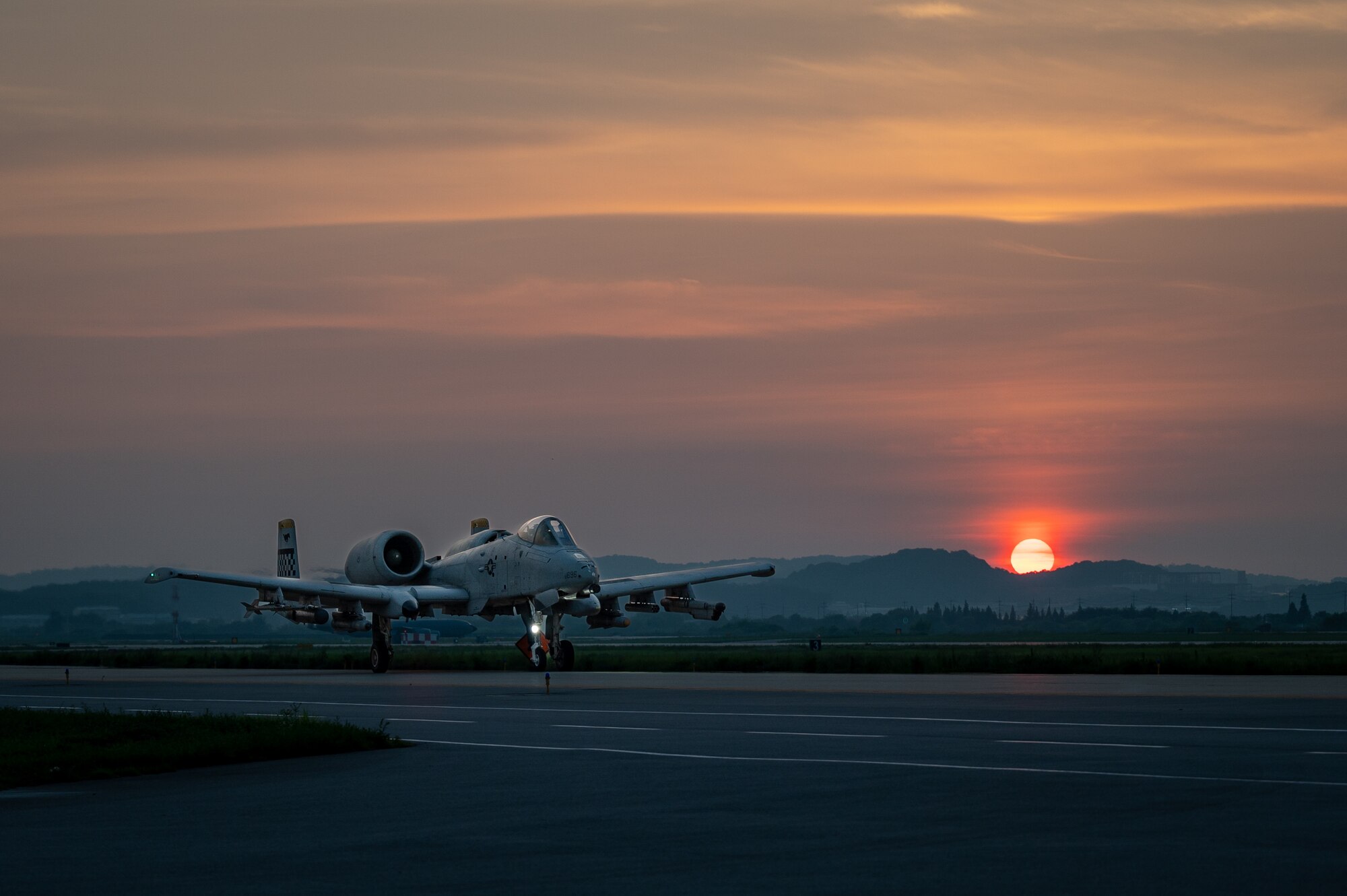 A U.S. Air Force A-10C Thunderbolt II assigned to the 51st Fighter Wing, takes off using an Alternate Landing Surface (ALS) at Osan AB, Republic of Korea, Aug. 1, 2023. The ALS is conducted during routine training events to guarantee the 51st FW's ability to deploy aircraft, regardless of main runway damage. (U.S. Air Force photo by Staff Sgt. Thomas Sjoberg)