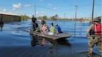 Military evacuates family by boat