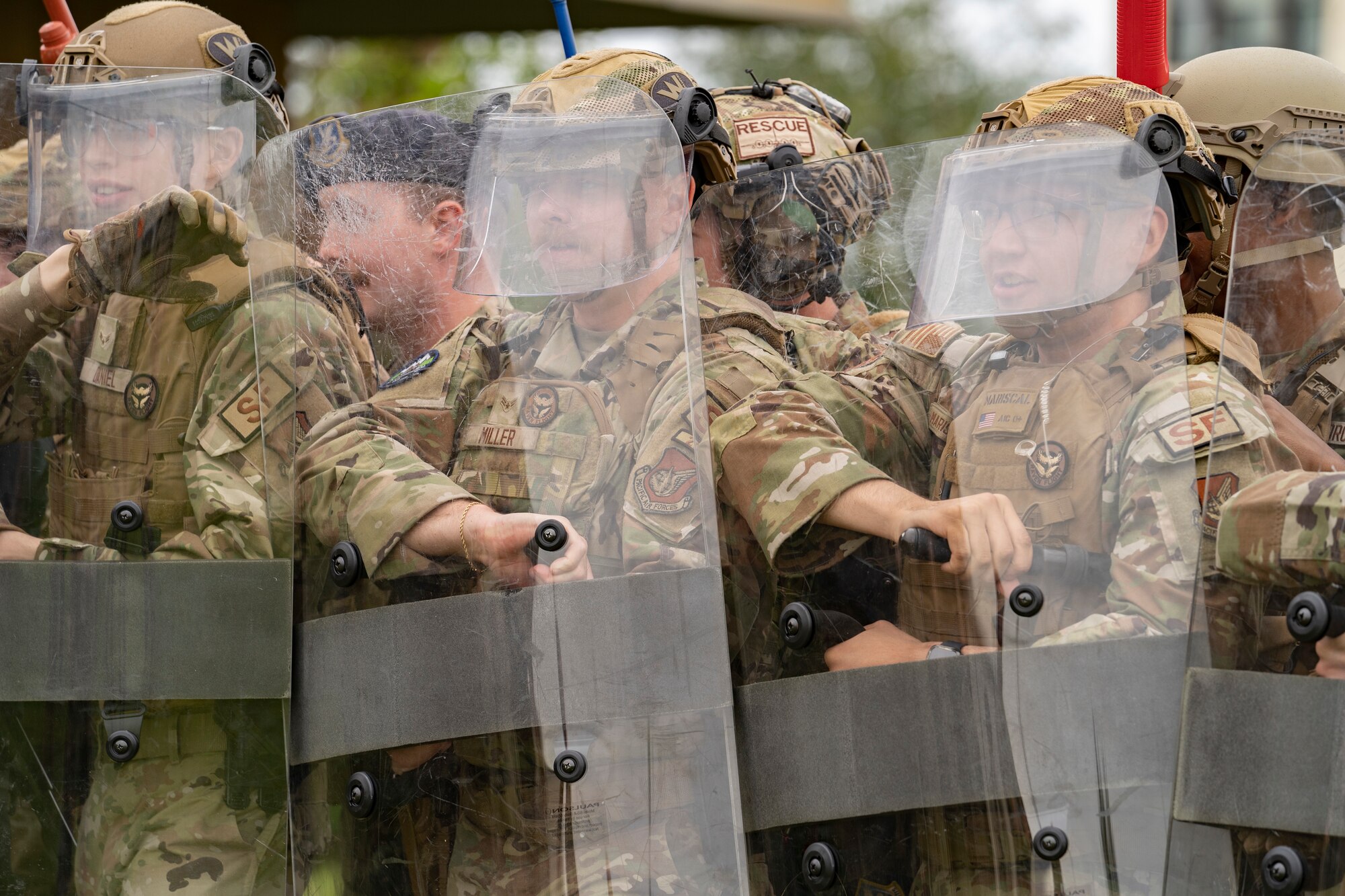 Security Forces Airmen participate in riot-control training.