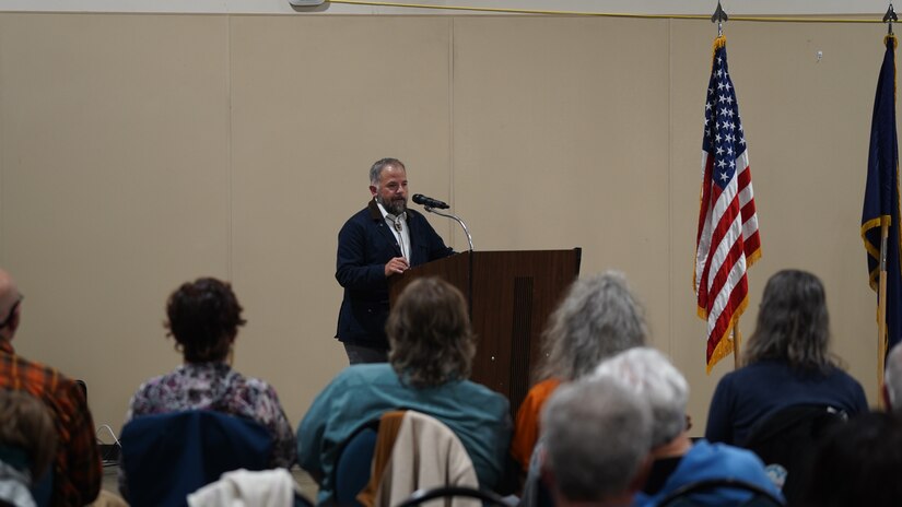 Alex Cleghorn, tribal council president of the 
Tangirnaq Native Village, talks to more than 
150 community members July 27, 2023, at the 
Kodiak Reediness Center in Kodiak, Alaska.