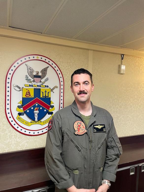 A Marine poses for a photo.