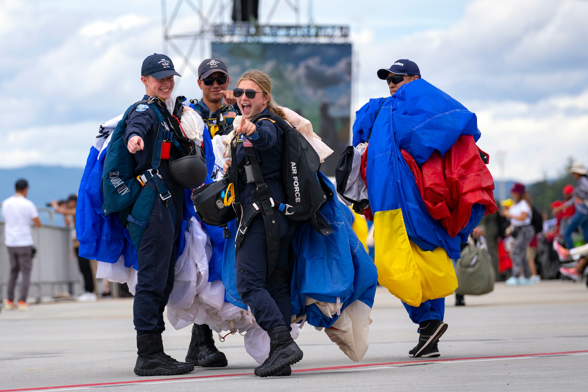 U.S. Air Force Academy Wings of Blue and Colombian Air Force Águila De Gules team members complete a precision parachuting demonstration during F-AIR Colombia International Aeronautics and Space Fair at the José María Córdova Airport in Rionegro, Colombia, July 14, 2023. The teams jumped together during F-AIR Colombia 2023, marking a first for the USAFA Wings of Blue in its 60-plus year history. U.S. Air Force photo by Tech. Sgt. Rachel Maxwell