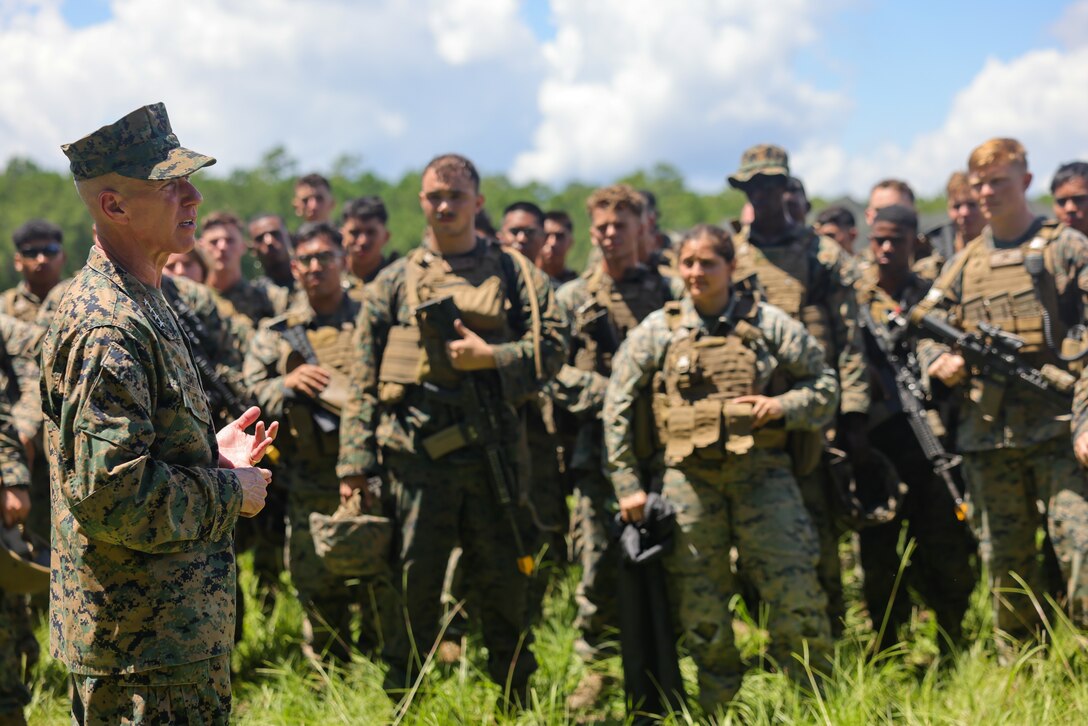 The 36th Assistant Commandant of the Marine Corps, Gen. Eric M. Smith, speaks with Marines with 1st Battalion, 10th Marine Regiment , 2d Marine Division, during a Marine Corps Combat Readiness Evaluation on Camp Lejeune, North Carolina, July 24, 2023. General Smith visited Marines with 1st Battalion, 10th Marine Regiment, 2d Marine Division as part of a command tour. (U.S. Marine Corps photos by Lance Cpl. Ryan Ramsammy)