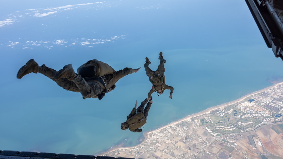 U.S. Marines with Task Force 61/2.5 (Force Reconnaissance Company), participate in a high-altitude parachute jump in Rota, Spain on June 22, 2023. Task Force 61/2.5 provides naval and joint force commanders with dedicated multi-domain reconnaissance and counter reconnaissance (RXR) capabilities. (U.S. Marine Corps photo by Lance Cpl. Emma Gray)