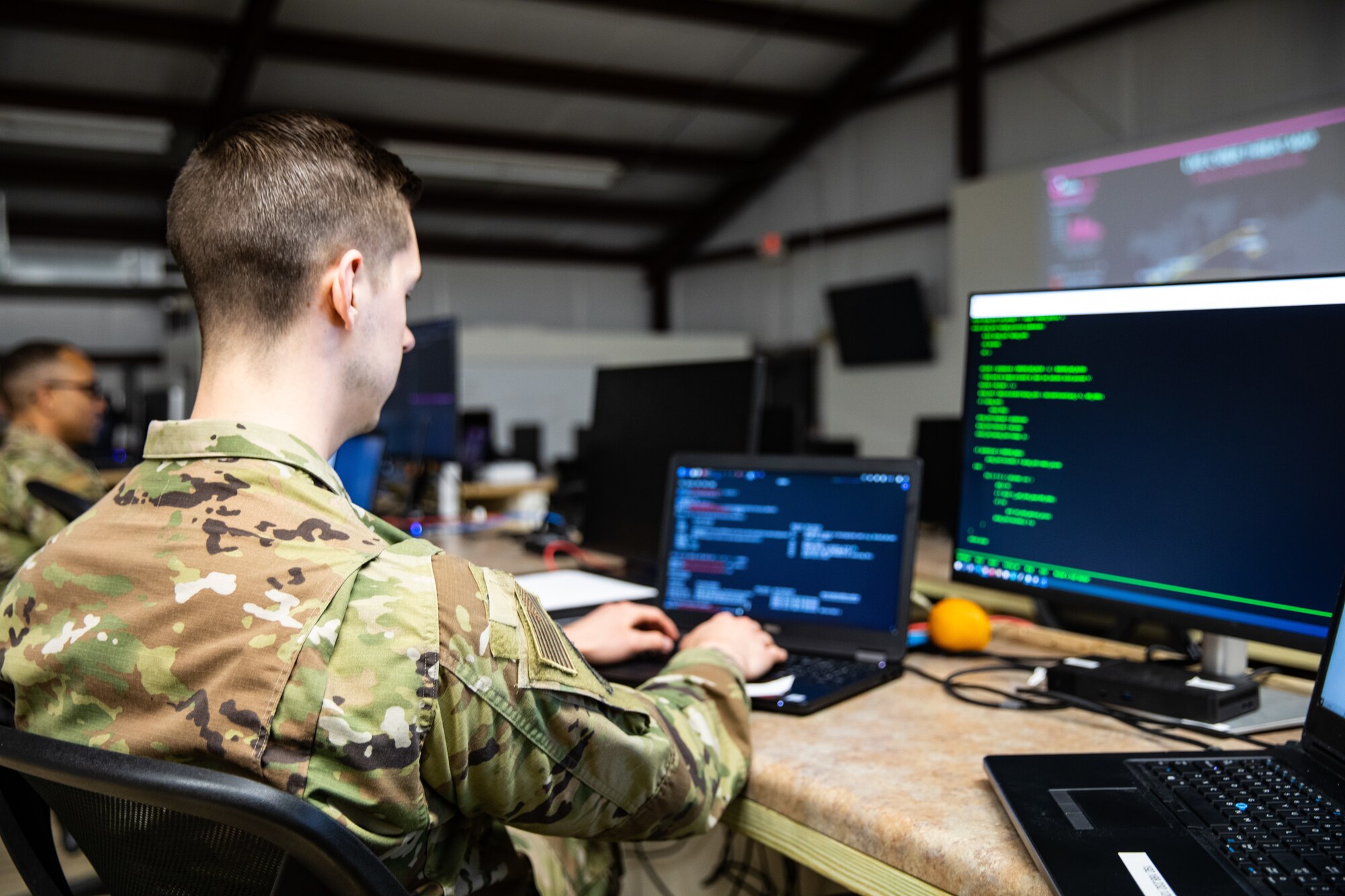 Staff Sgt. Tullis Moore a cyber operator with 175th Cyber Operations, Maryland Air National Guard monitors cyber attacks during Exercise Southern Strike at Camp Shelby, Mississippi, April 21, 2023.
