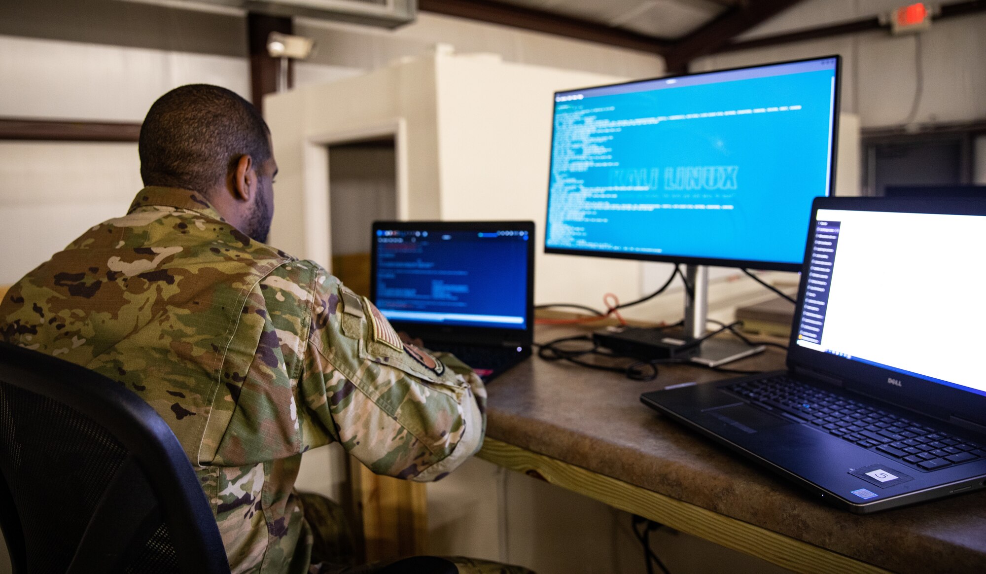 Staff Sgt. Demetrius Deck a cyber operator with 175th Cyber Operations, Maryland Air National Guard monitors cyber attacks during Exercise Southern Strike at Camp Shelby, Mississippi, April 21, 2023.