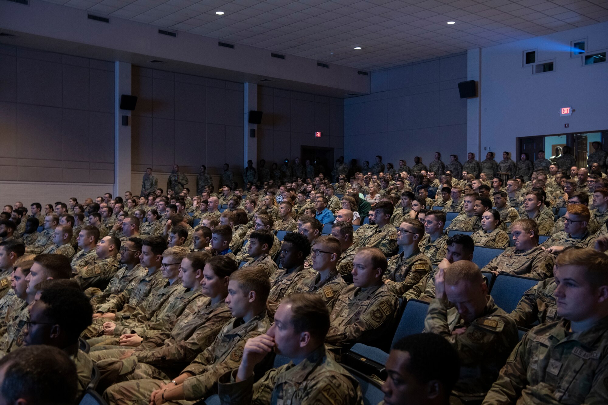 Airmen and civilians assigned to the 22nd Air Refueling Wing attend a commander's all-call briefing Aug. 1, 2023, at McConnell Air Force Base, Kansas. The briefing highlighted the recent work of McConnell Airmen, Exercise Mobility Guardian, innovation opportunities, information warfare and the road ahead for the wing. (U.S. Air Force photo by Airman 1st Class Gavin Hameed)