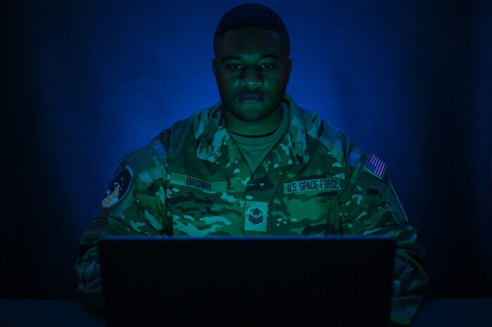 U.S. Space Force Sgt. Dwight Brown, 645th Cyberspace Squadron defensive cyber operations supervisor poses for a photo at Patrick Space Force Base, Florida, July 5, 2023. The 645th Cyberspace Squadron supports Space Launch Delta 45 by working closely with intel and other agencies to identify and prevent advanced, persistent threats interfering with launch capabilities. (U.S. Space Force photo by Senior Airman Samuel Becker)