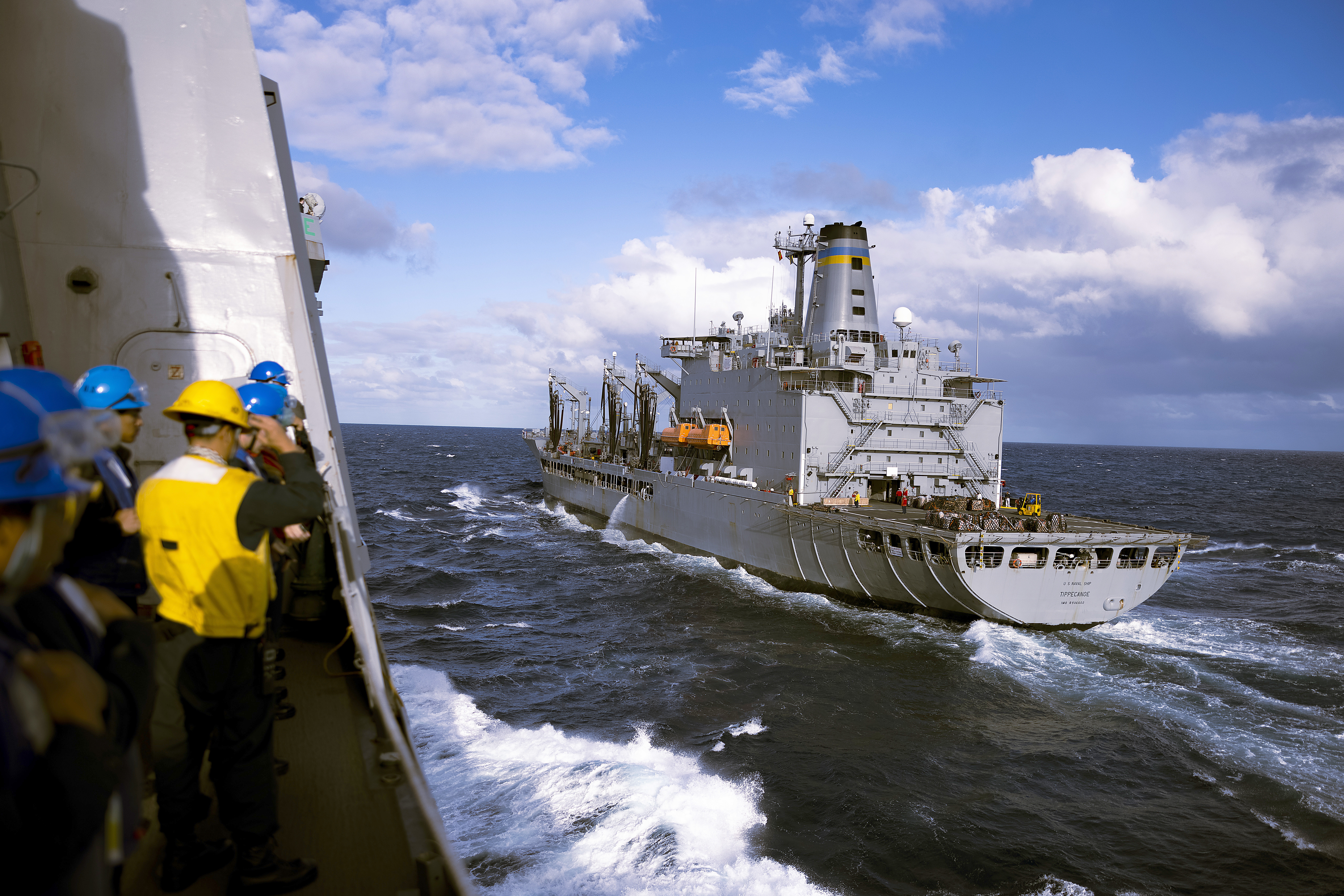USS New Orleans (LPD 18) replenishes from USNS Tippecanoe (T-AO 199).