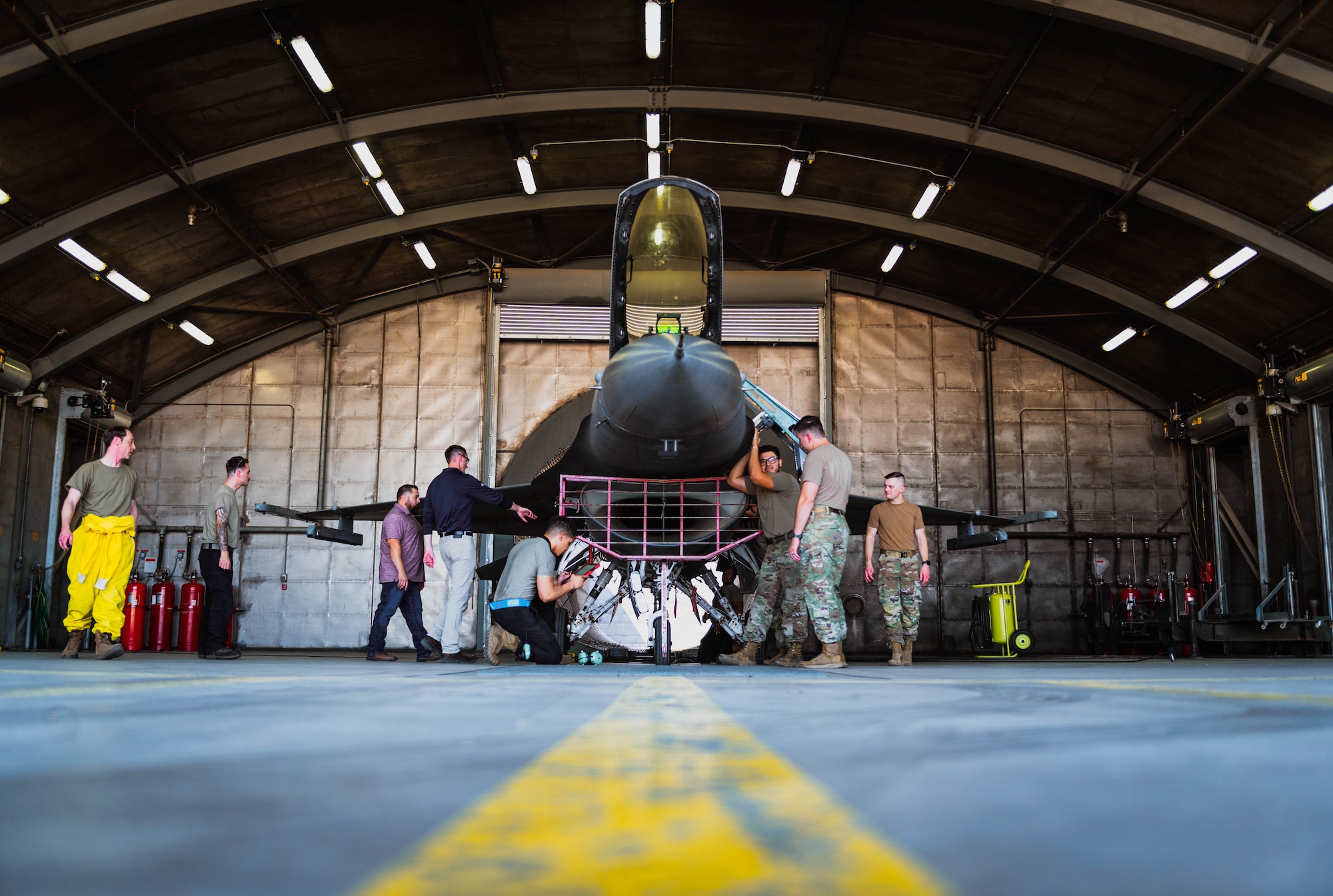 Air Force Engineering Technical Services personnel and U.S. Air Force Airmen assigned to the 56th Fighter Wing, prepare to conduct installed engine operation certification.